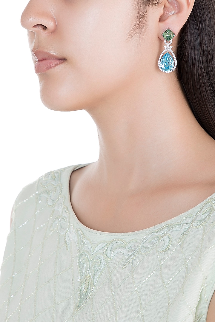 White Rhodium Plated Faux Diamond & Topaz Earrings by Aster at Pernia's Pop Up Shop