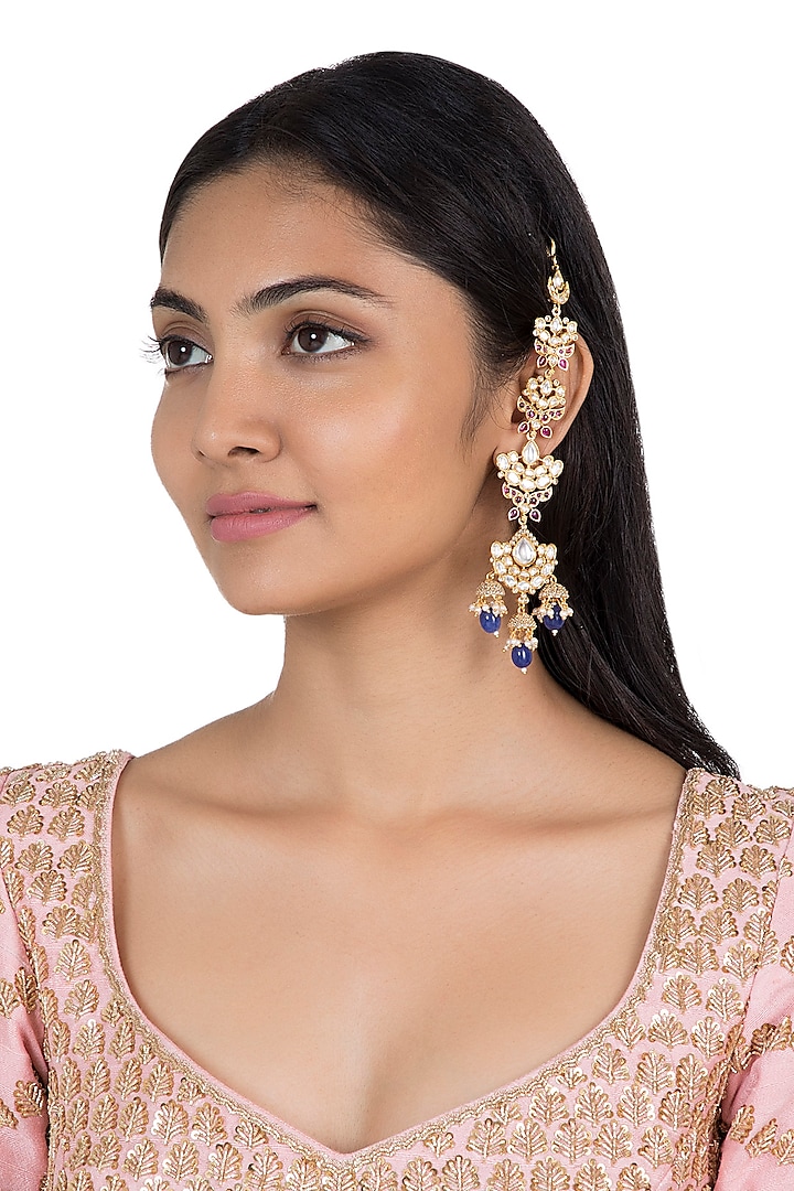 Silver plated faux kundan and blue stone earrings by Aster