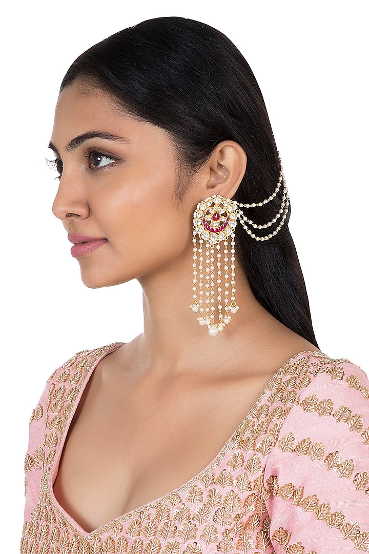 Gold plated faux kundan long earrings by Aster