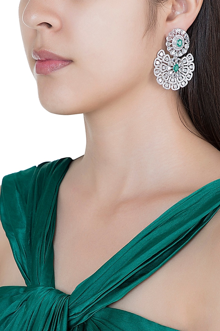 Silver plated faux diamond and emerald floral earrings by Aster