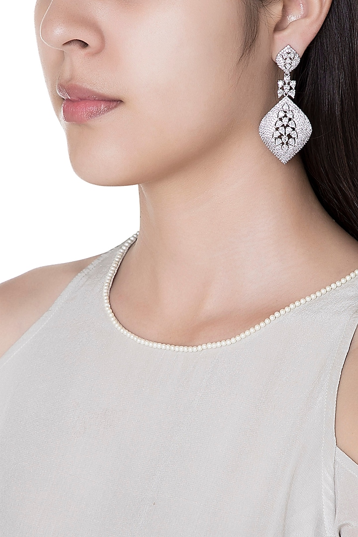 Silver plated faux diamond dangler earrings by Aster