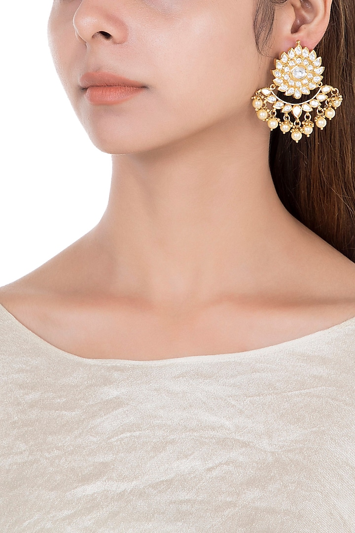 Gold plated faux kundan earrings by Aster