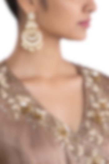Gold plated faux kundan chandbali earrings by Aster