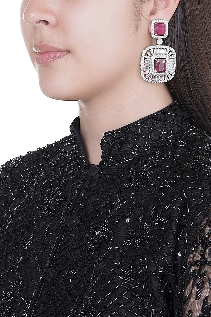 White Finish Faux Diamonds & Red Stones Earrings by Aster