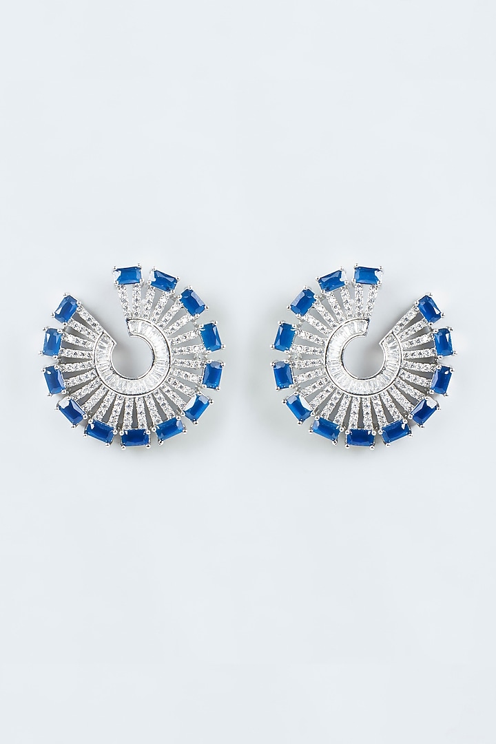 White Finish Faux Diamonds Earrings With Blue Synthetic Stones by Aster at Pernia's Pop Up Shop