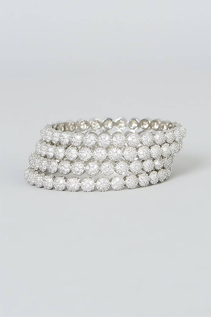 White Finish Zircon Bangles (Set of 4) by Aster at Pernia's Pop Up Shop