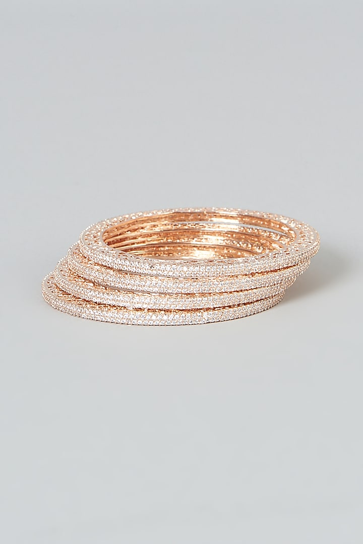 Rose Gold Finish Zircon Bangles (Set of 4) by Aster at Pernia's Pop Up Shop