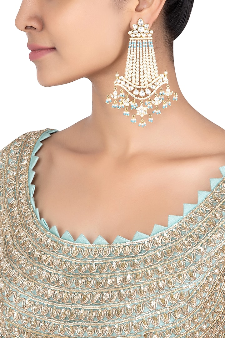 Gold plated turquoise dangler earrings by ASTER at Pernia's Pop Up Shop
