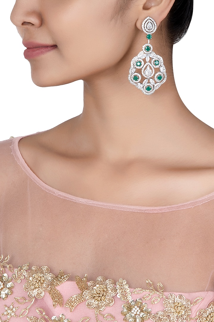 Silver plated faux diamond and emerald earrings available only at Pernia's Pop Up Shop.