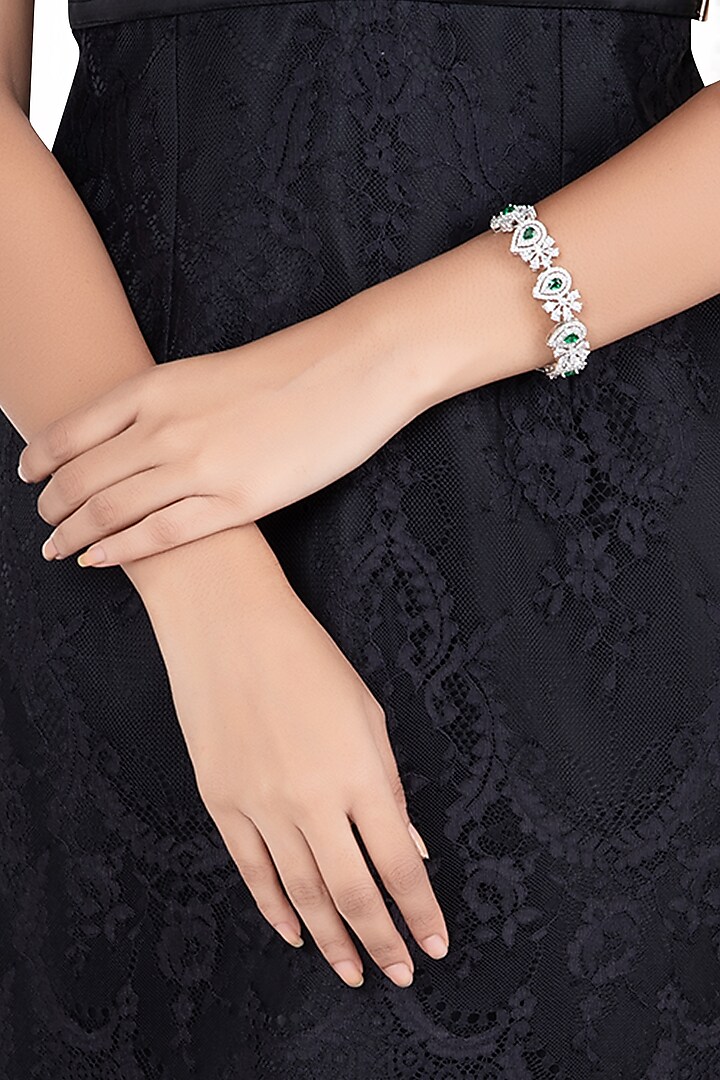 Silver plated faux diamond and emerald bracelet by Aster