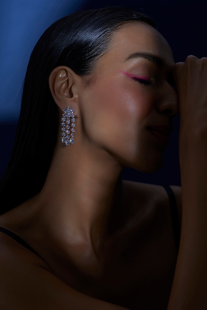 White Finish Zircon Dangler Earrings by Aster at Pernia's Pop Up Shop