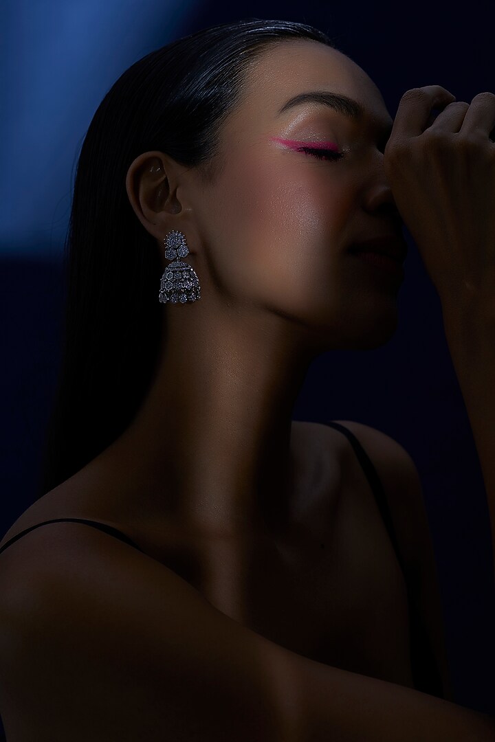 White Finish Zircon Jhumka Earrings by Aster at Pernia's Pop Up Shop