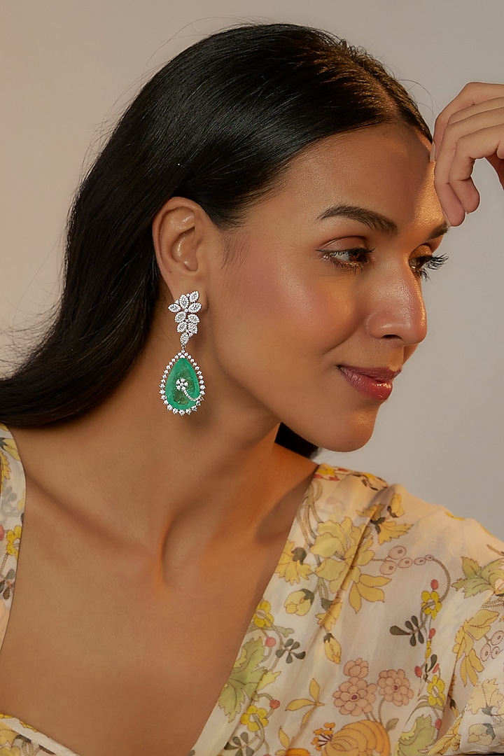 White Finish Zircon & Green Synthetic Stone Dangler Earrings by Aster at Pernia's Pop Up Shop