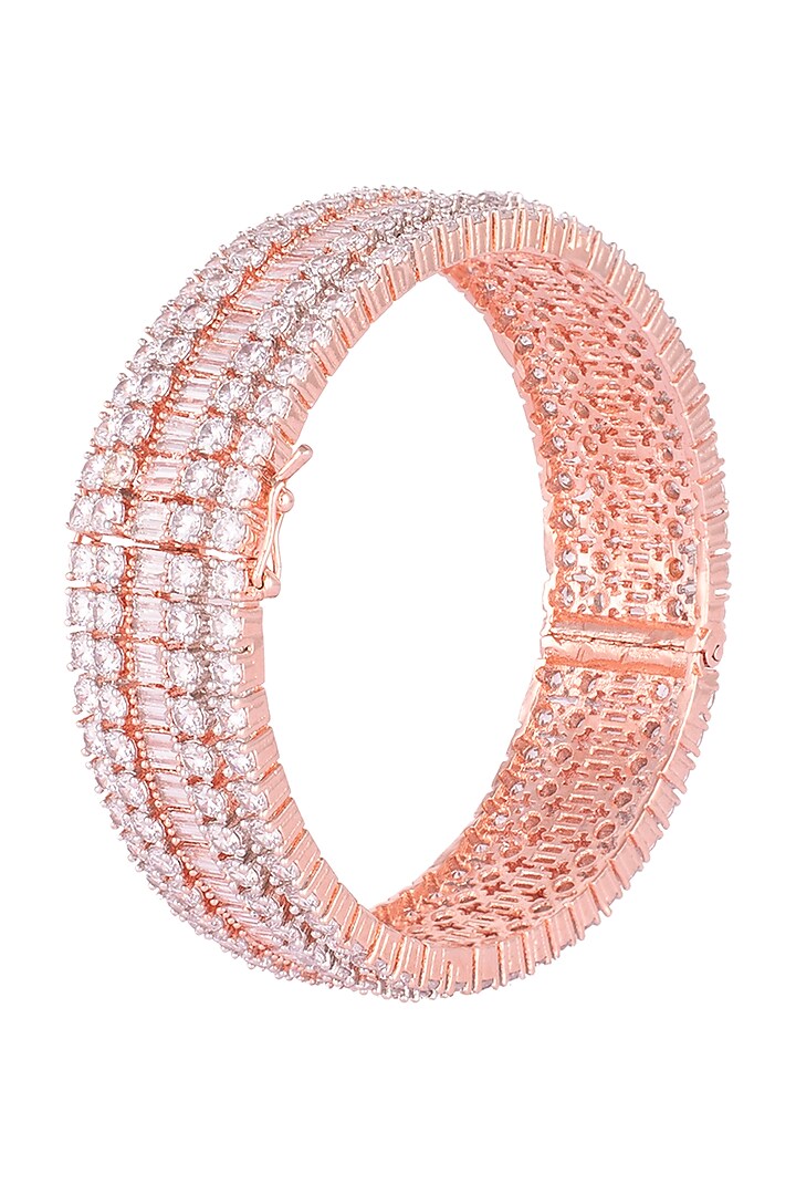 Rose gold plated round diamond baguette bangle by Aster at Pernia's Pop Up Shop