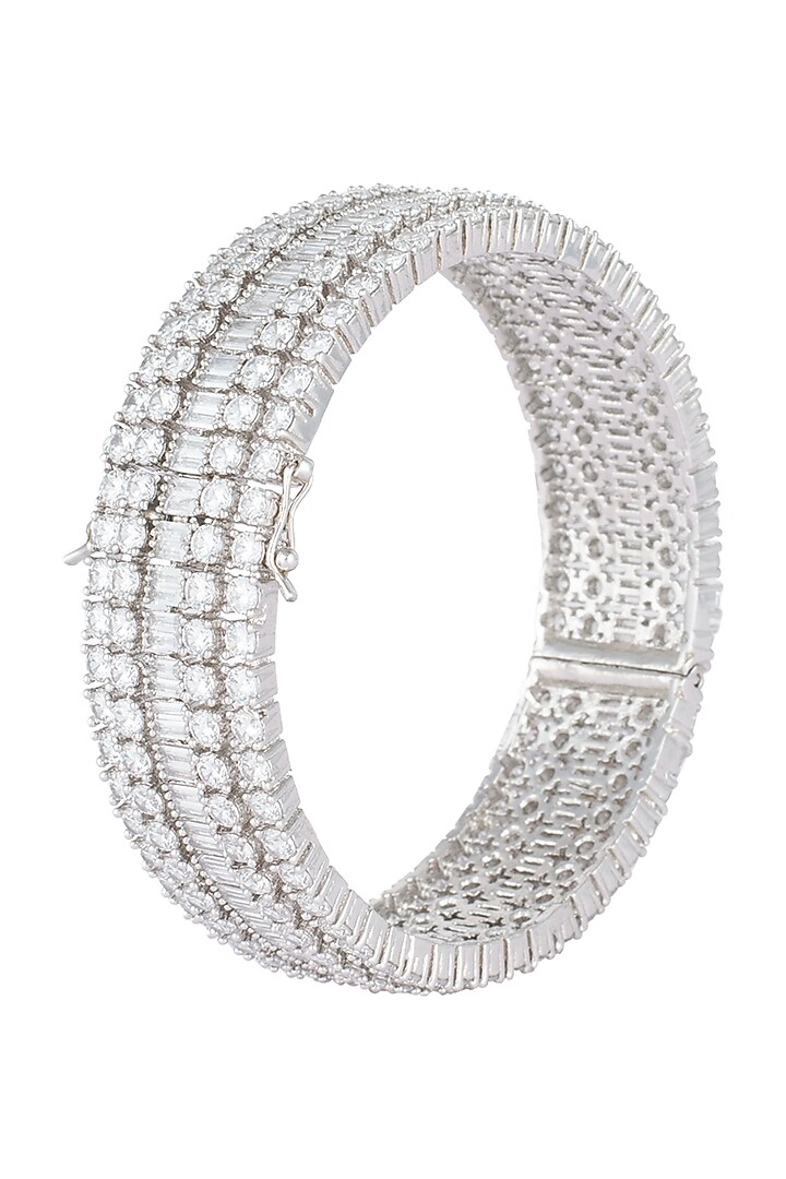 Silver plated faux round diamond baguette bangle by Aster at Pernia's Pop Up Shop