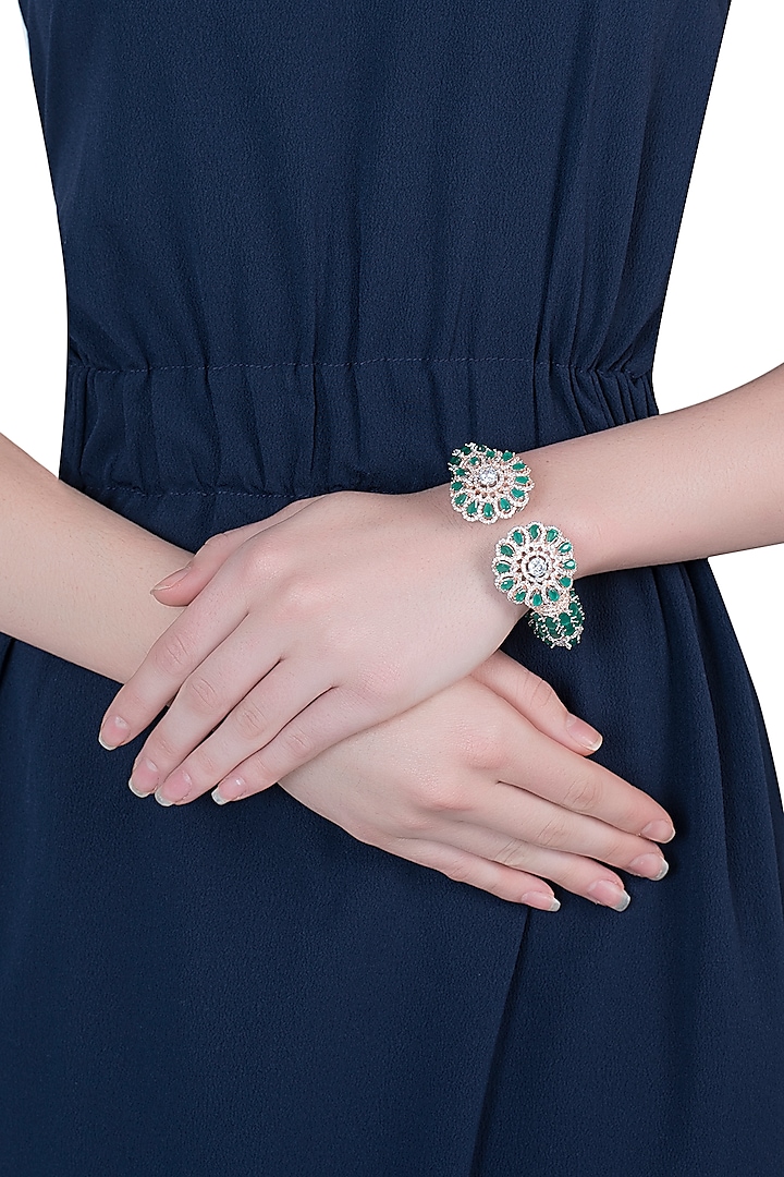 Silver plated faux diamond and emerald floral bracelet by Aster