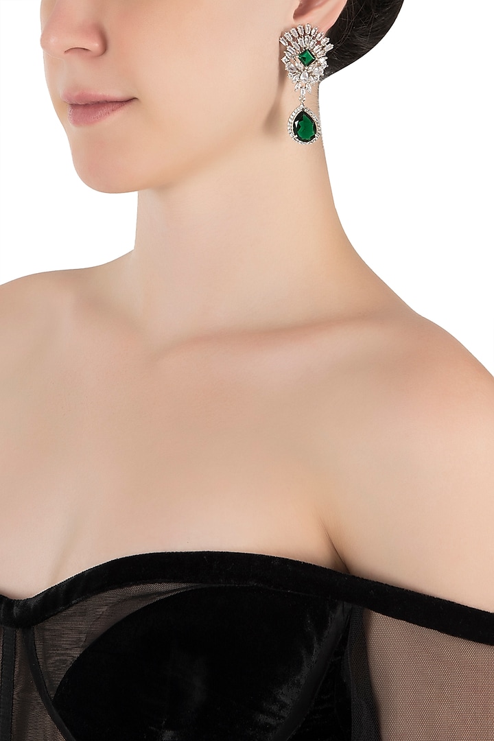 Silver plated diamond and faux emerald drop earrings by Aster
