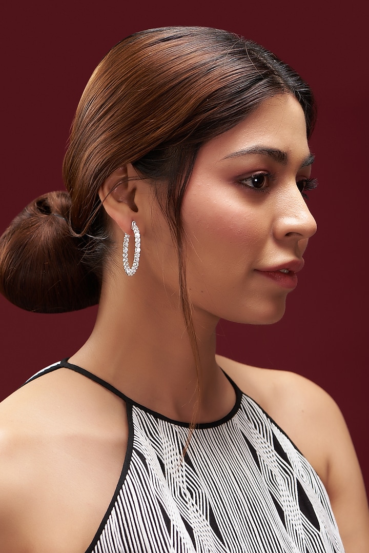 White Finish Faux Diamond Hoop Earrings by Aster at Pernia's Pop Up Shop
