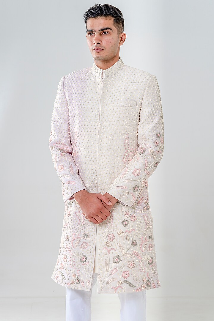 Salmon Pink Raw Silk Motif Embellished Groom Sherwani Set by Amrit Dawani at Pernia's Pop Up Shop