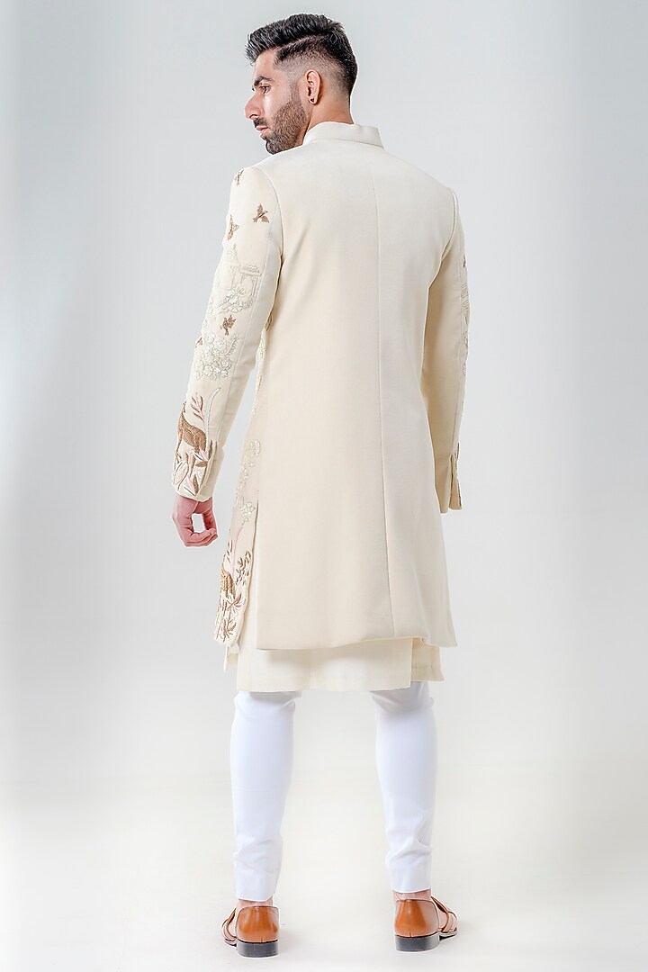 Ivory Velvet Embellished Groom Sherwani Set by Amrit Dawani at Pernia's Pop Up Shop