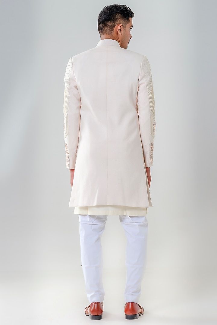 Ivory Raw Silk Embellished Groom Sherwani Set by Amrit Dawani at Pernia's Pop Up Shop