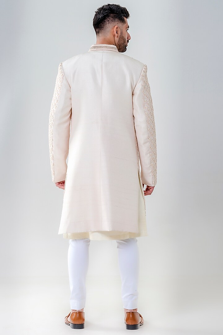 Salmon Pink Raw Silk Embellished Groom Sherwani Set by Amrit Dawani at Pernia's Pop Up Shop