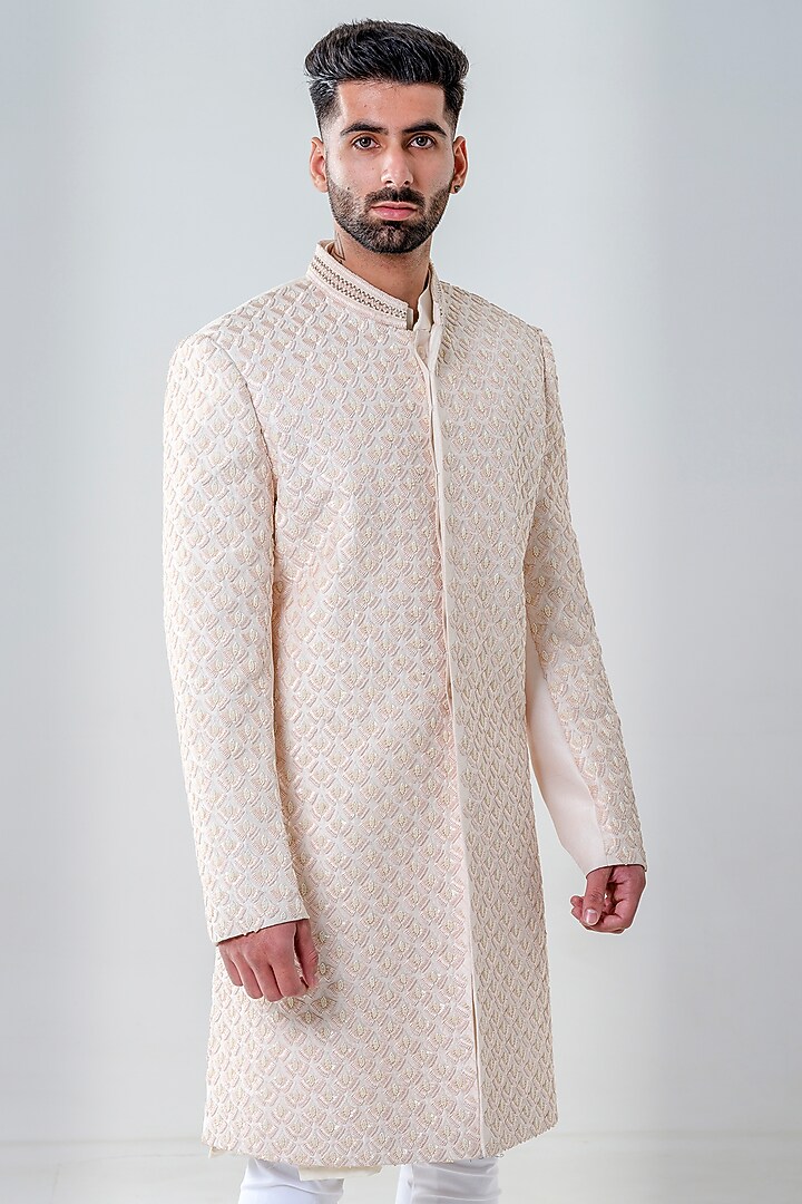 Salmon Pink Raw Silk Embellished Groom Sherwani Set by Amrit Dawani at Pernia's Pop Up Shop