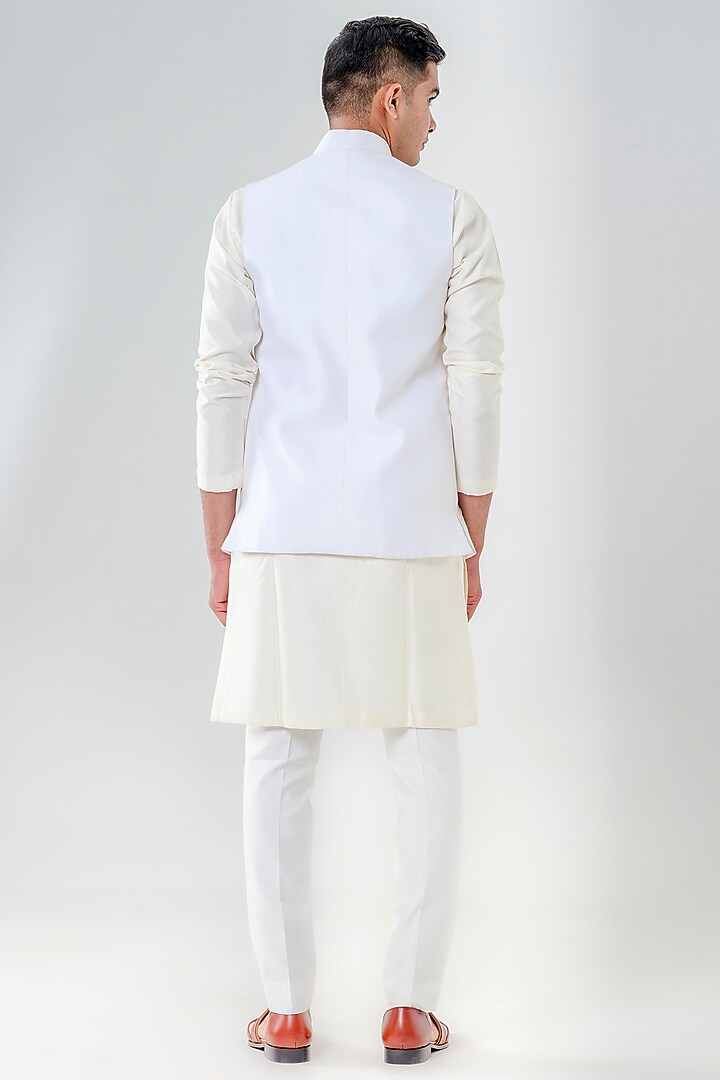 Ivory Dupion Silk Embroidered Bundi Jacket Set by Amrit Dawani at Pernia's Pop Up Shop
