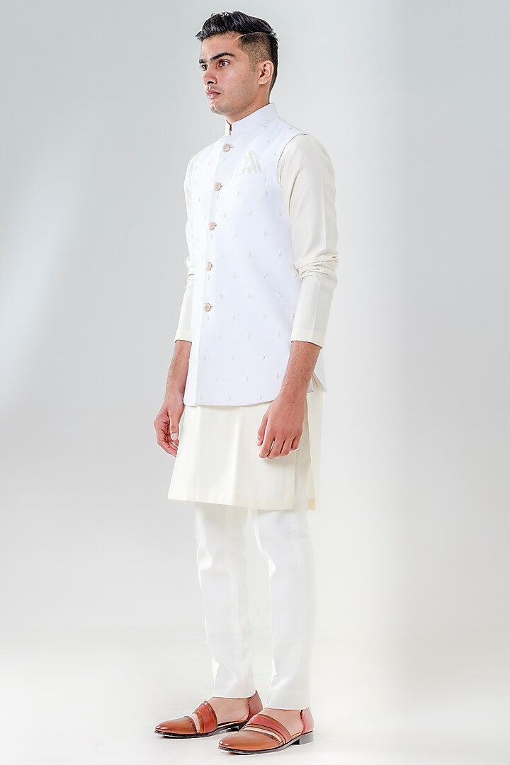 Ivory Dupion Silk Embroidered Bundi Jacket Set by Amrit Dawani at Pernia's Pop Up Shop