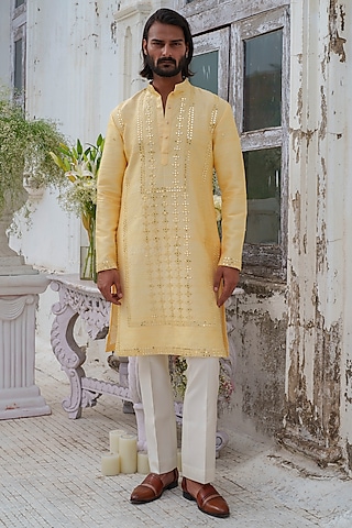 Yellow Raw Silk Mirror Embroidered Kurta Set by Amrit Dawani