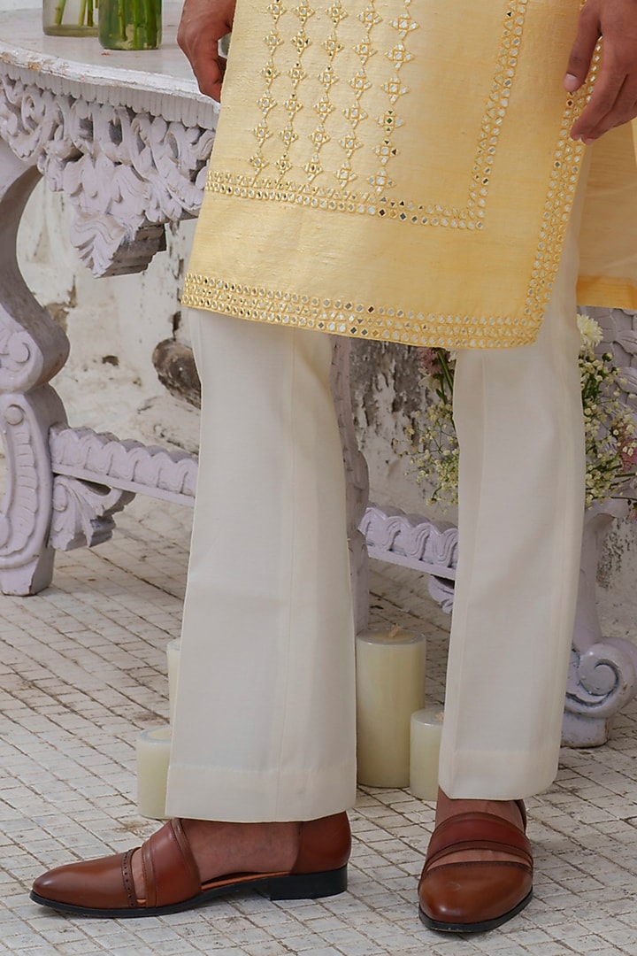 Yellow Raw Silk Mirror Embroidered Kurta Set by Amrit Dawani at Pernia's Pop Up Shop