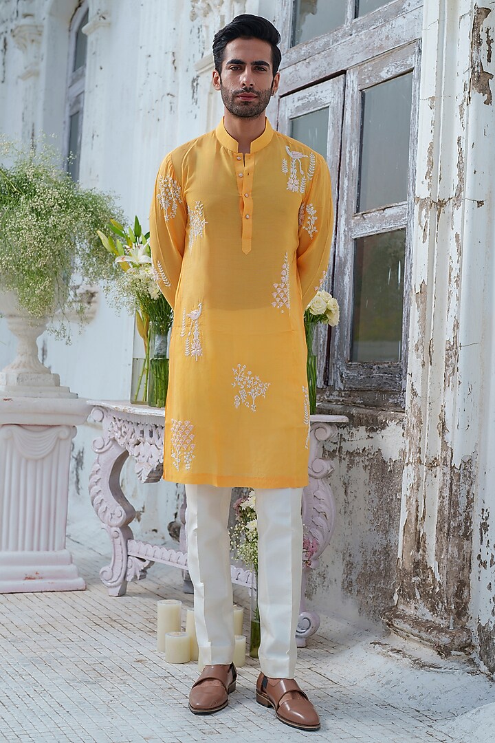 Yellow Muslin Embroidered Kurta Set by Amrit Dawani at Pernia's Pop Up Shop