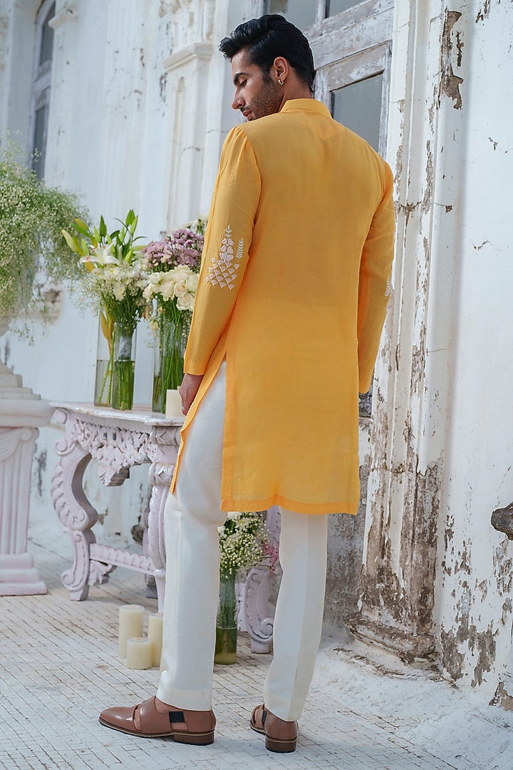 Yellow Muslin Embroidered Kurta Set by Amrit Dawani at Pernia's Pop Up Shop