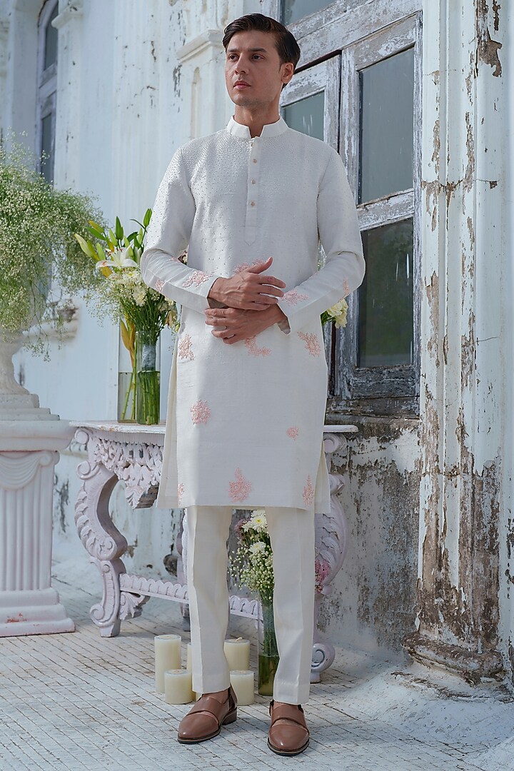 Ivory Raw Silk Floral Embroidered Kurta Set by Amrit Dawani at Pernia's Pop Up Shop