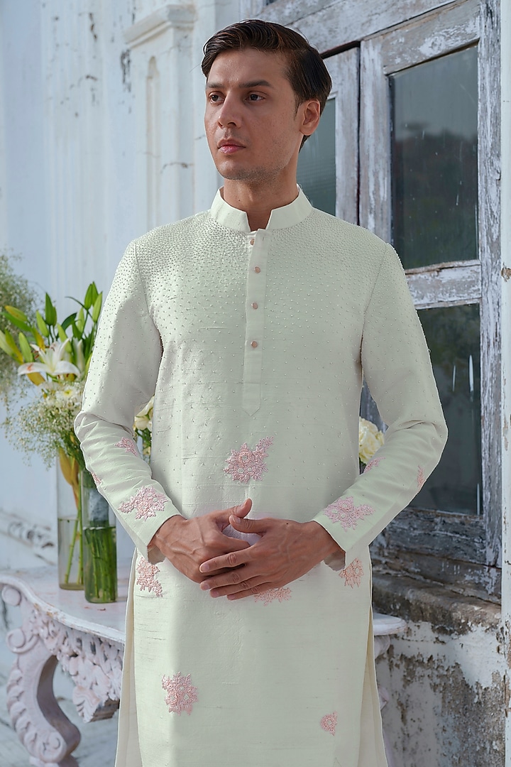 Ivory Raw Silk Floral Embroidered Kurta Set by Amrit Dawani at Pernia's Pop Up Shop