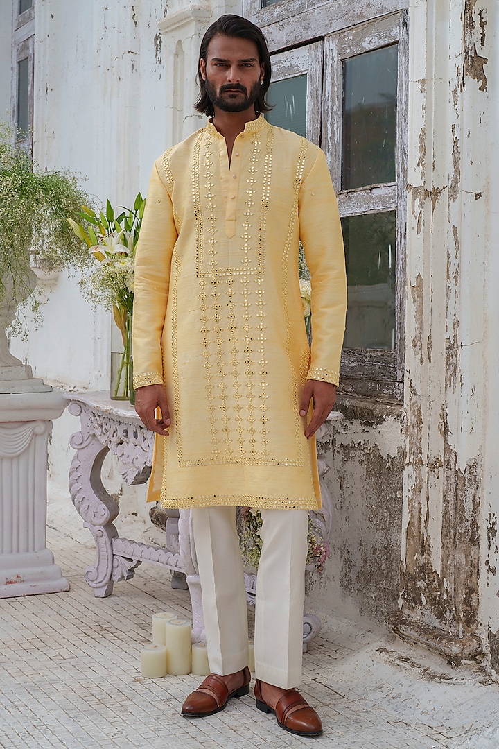 Yellow Raw Silk Mirror Embroidered Kurta Set by Amrit Dawani