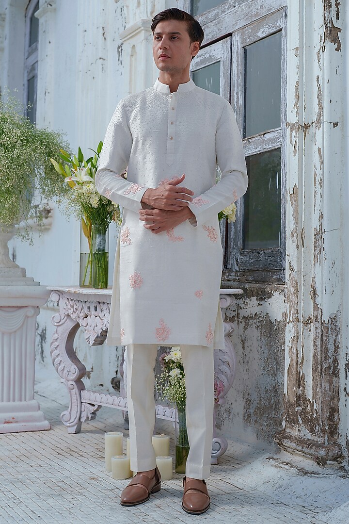 Ivory Raw Silk Floral Embroidered Kurta Set by Amrit Dawani at Pernia's Pop Up Shop