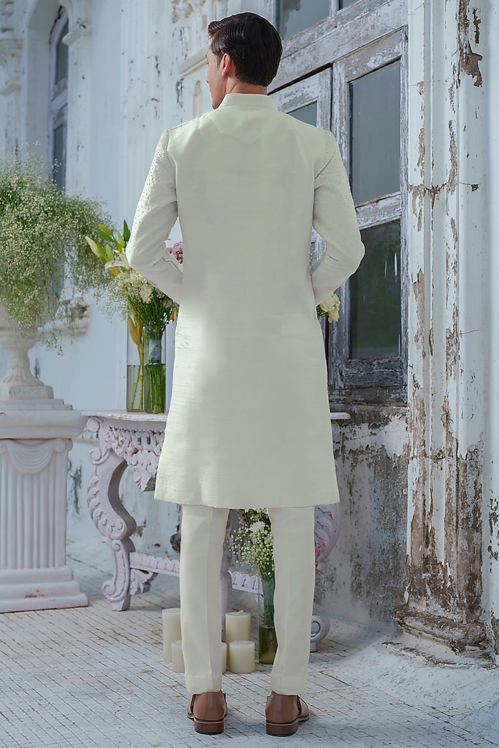 Ivory Raw Silk Floral Embroidered Kurta Set by Amrit Dawani at Pernia's Pop Up Shop