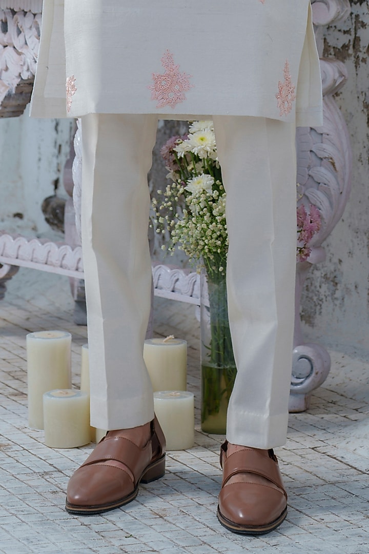 Ivory Raw Silk Floral Embroidered Kurta Set by Amrit Dawani at Pernia's Pop Up Shop