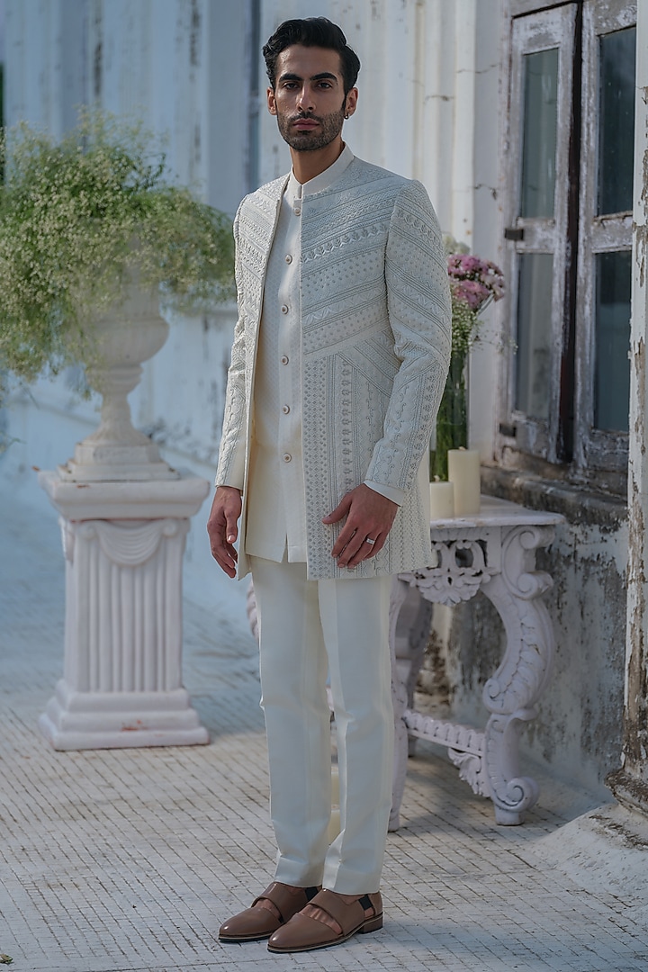 Ivory Raw Silk Hand Embroidered Groom Indowestern Set by Amrit Dawani at Pernia's Pop Up Shop