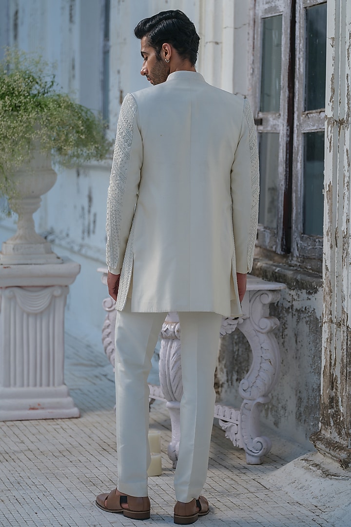 Ivory Raw Silk Hand Embroidered Groom Indowestern Set by Amrit Dawani at Pernia's Pop Up Shop