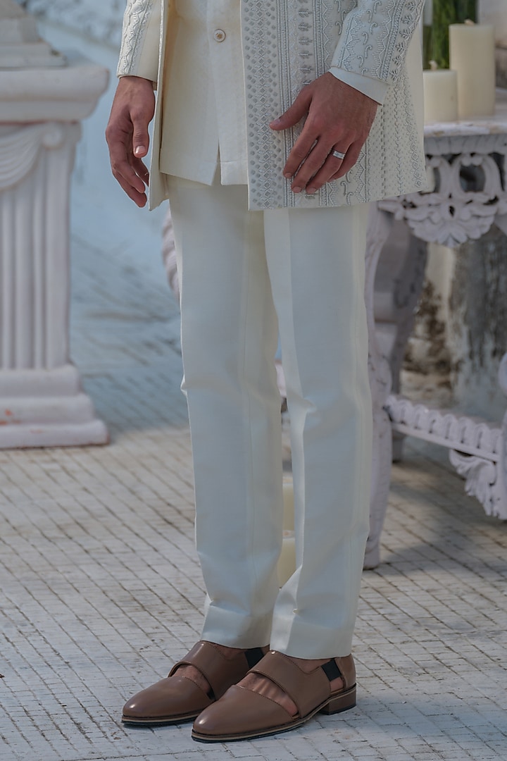 Ivory Raw Silk Hand Embroidered Groom Indowestern Set by Amrit Dawani at Pernia's Pop Up Shop
