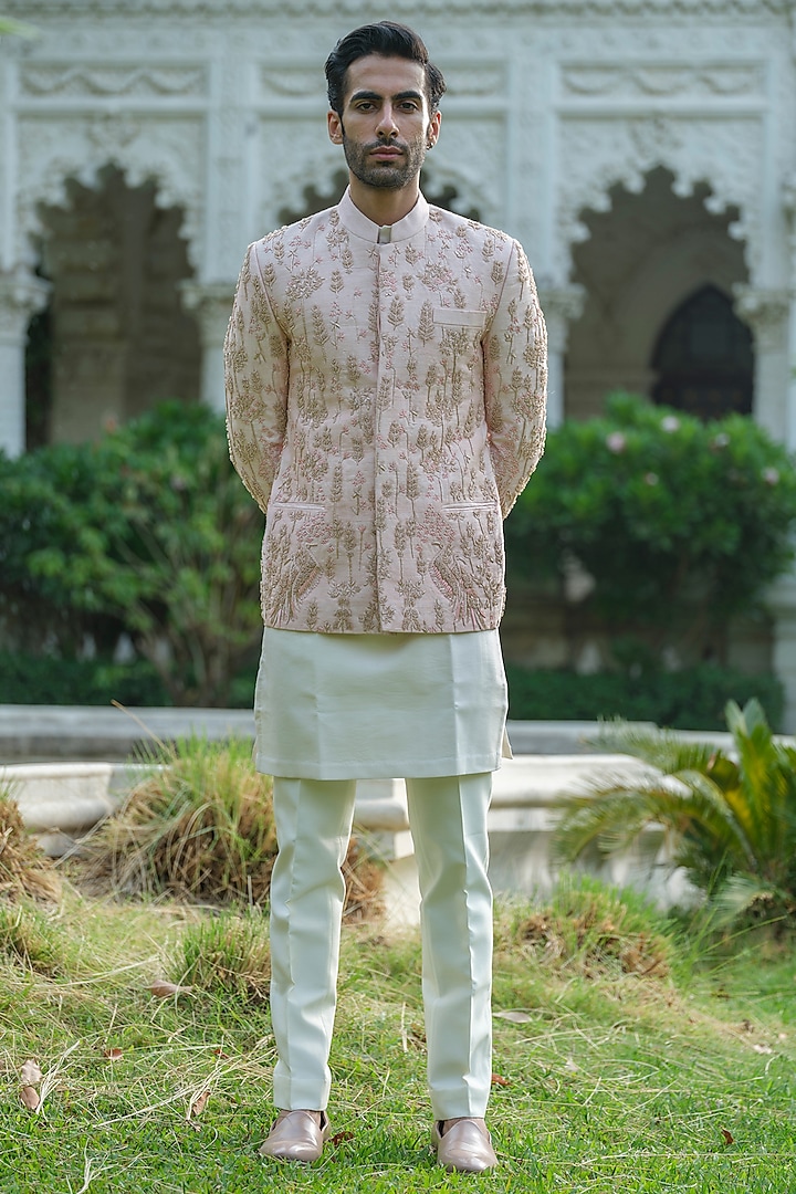 Rose Gold Raw Silk Embroidered Bandhgala Set by Amrit Dawani