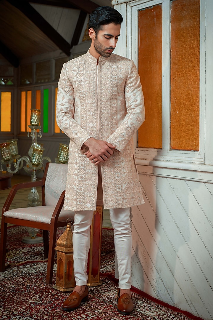 Rose Gold Raw Silk Motif & Beads Embroidered Groom Sherwani Set by Amrit Dawani at Pernia's Pop Up Shop