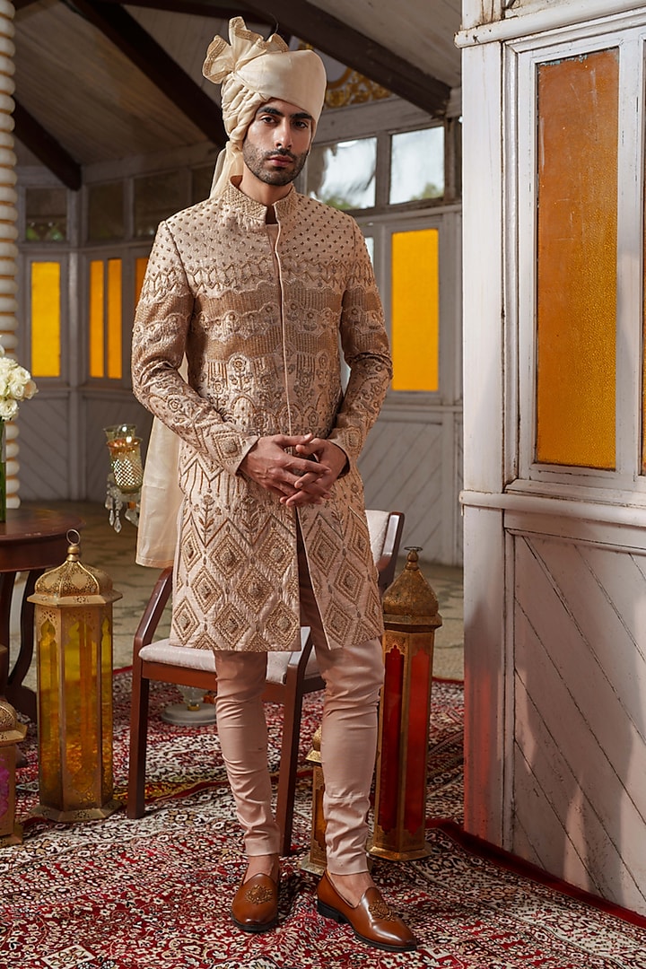 Gold Raw Silk Zardosi & Zari Embroidered Sherwani Set by Amrit Dawani