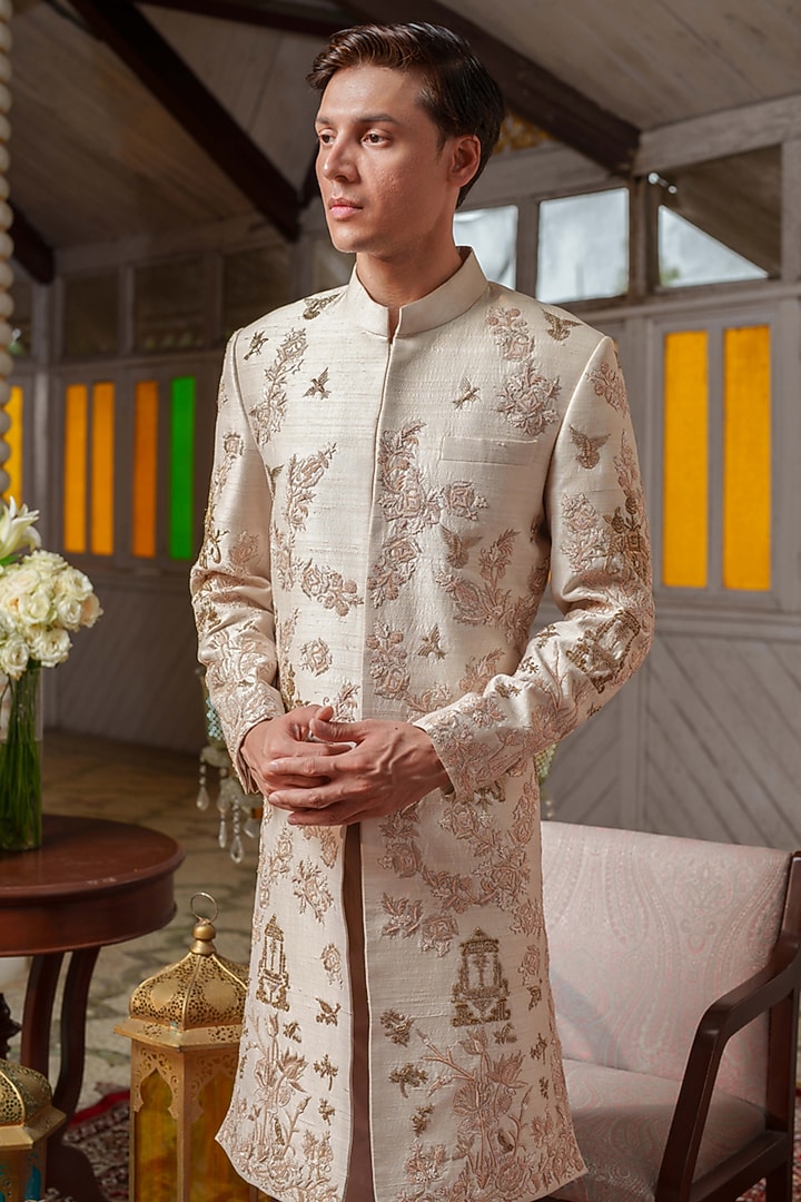 Beige Gold Raw Silk Zari & Resham Embroidered Groom Sherwani Set by Amrit Dawani at Pernia's Pop Up Shop