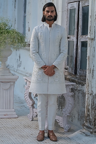 Ivory Raw Silk Floral Hand Embroidered Sherwani Set by Amrit Dawani