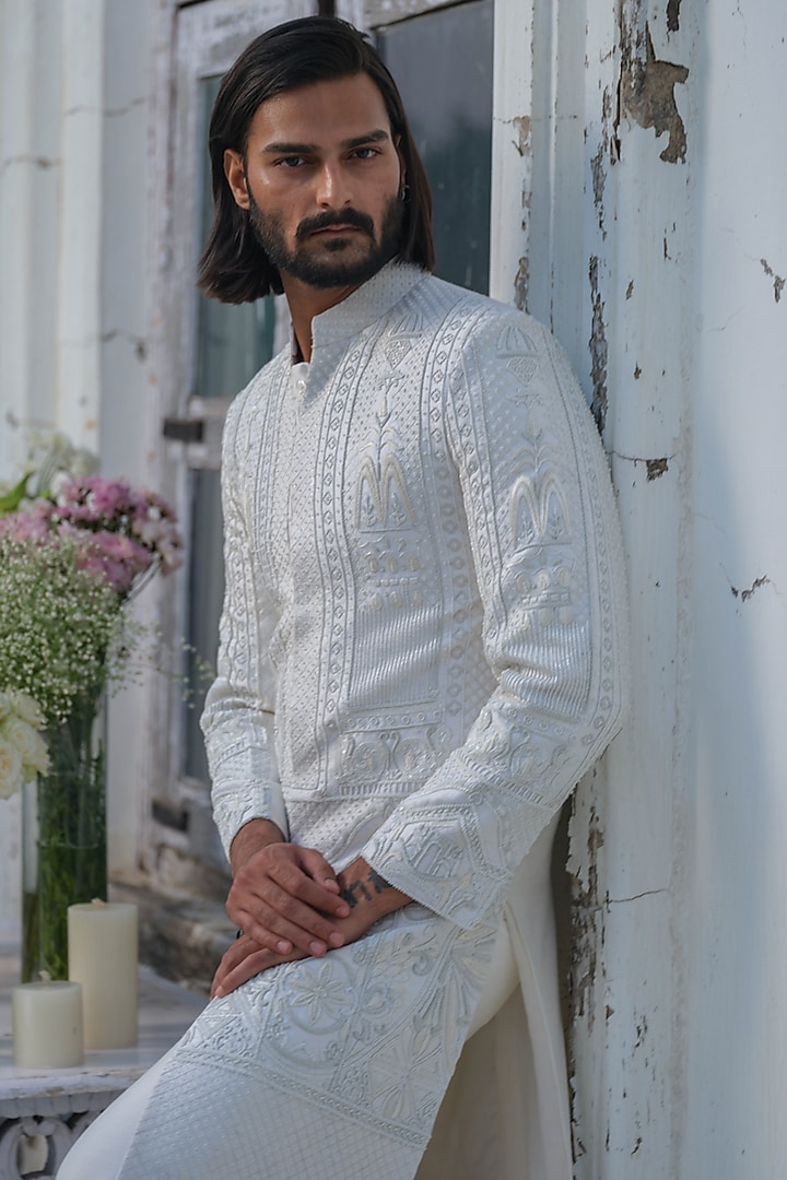 Ivory Raw Silk Floral Hand Embroidered Groom Sherwani Set by Amrit Dawani at Pernia's Pop Up Shop