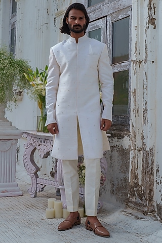Ivory Raw Silk Thread Embroidered Sherwani Set by Amrit Dawani