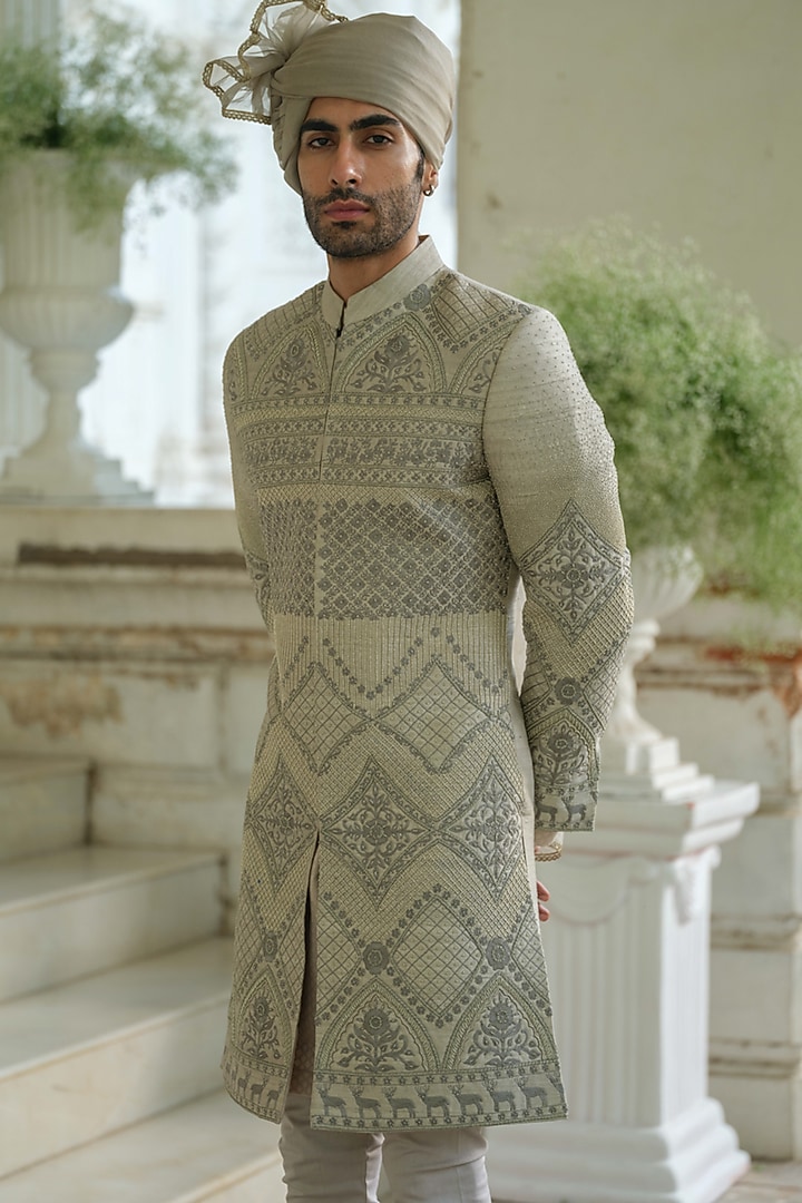 Olive Green Raw Silk Floral Embroidered Groom Sherwani Set by Amrit Dawani at Pernia's Pop Up Shop